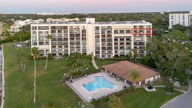 Experience refined coastal living at its finest in this