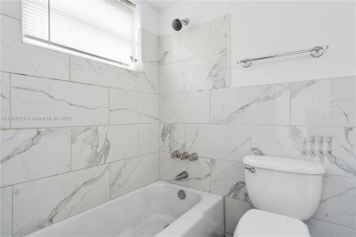 Beautifully renovated 1st-floor condo in the heart of Hallandale