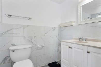 Beautifully renovated 1st-floor condo in the heart of Hallandale