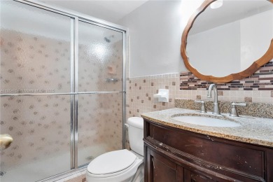 Beautifully renovated 1st-floor condo in the heart of Hallandale