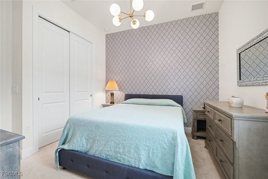 Welcome to this beautifully designed WCI-built 4-bedroom, 3-bath