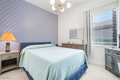 Welcome to this beautifully designed WCI-built 4-bedroom, 3-bath