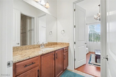 Welcome to this beautifully designed WCI-built 4-bedroom, 3-bath