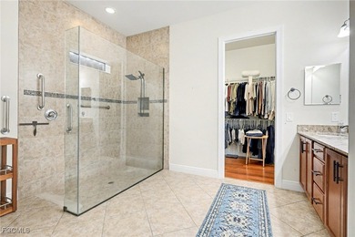 Welcome to this beautifully designed WCI-built 4-bedroom, 3-bath