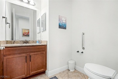 Welcome to this beautifully designed WCI-built 4-bedroom, 3-bath