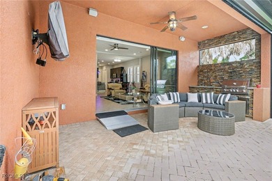 Welcome to this beautifully designed WCI-built 4-bedroom, 3-bath