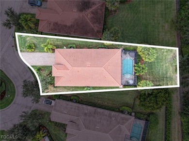 Welcome to this beautifully designed WCI-built 4-bedroom, 3-bath