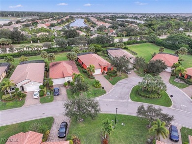 Welcome to this beautifully designed WCI-built 4-bedroom, 3-bath