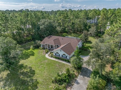 Tucked away on a peaceful 1.49-acre lot, this well-maintained