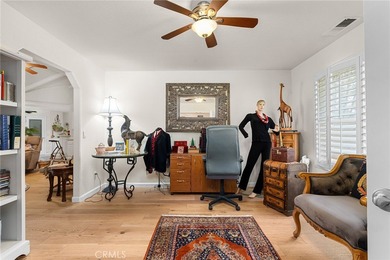 Nestled in the premier gated community of Woodland Park Estates