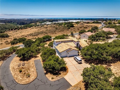 Perched atop the Arroyo Grande Mesa in the exclusive gated