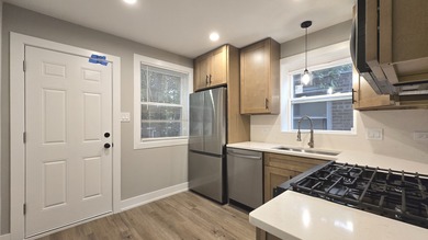 Newly remodeled 5 bedroom/3 bath brick Cape Cod on a nice