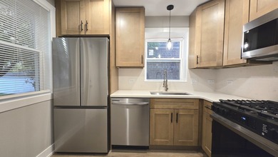 Newly remodeled 5 bedroom/3 bath brick Cape Cod on a nice