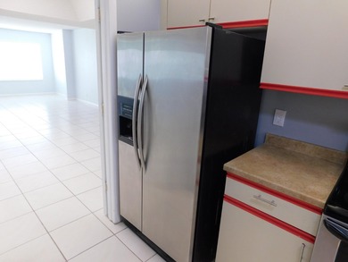 Welcome to this spacious first-floor condo, perfectly situated