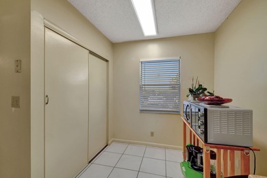 Welcome to this spacious first-floor condo, perfectly situated