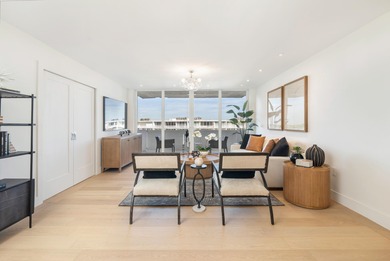 Experience breathtaking water views from this fully renovated