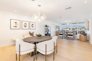 Experience breathtaking water views from this fully renovated