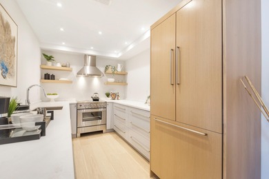 Experience breathtaking water views from this fully renovated