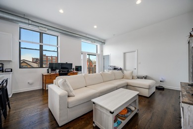 Rarely available top-floor, corner 1BR/1BA loft in the