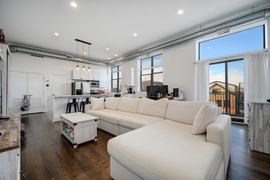 Rarely available top-floor, corner 1BR/1BA loft in the