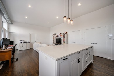 Rarely available top-floor, corner 1BR/1BA loft in the