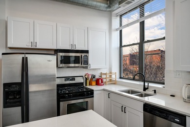 Rarely available top-floor, corner 1BR/1BA loft in the
