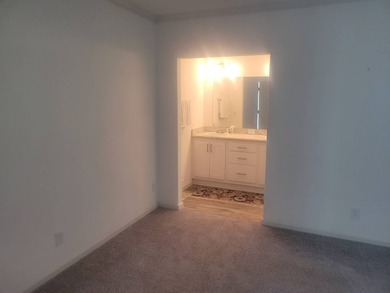 Welcome to Florida living at its finest in this almost-new