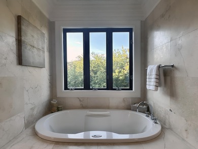 This Luxury Property offers a rare priced opportunity to live