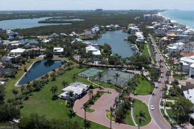 Just steps from the prestigious Barefoot Beach, experience