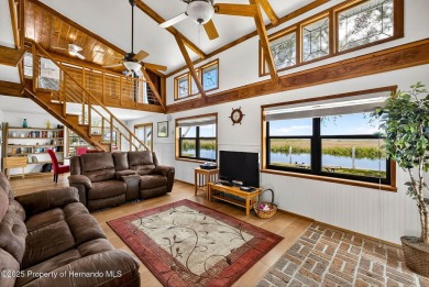 WATERFRONT and priced to sell! This beautiful home is sure to