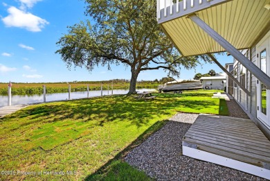 WATERFRONT and priced to sell! This beautiful home is sure to