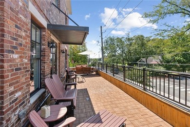 Welcome to your Downtown Woodstock dream home! This exceptional