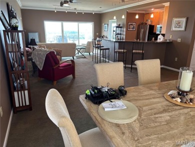 This one is ALL ABOUT THE VIEW !!!  This 2nd floor end unit has