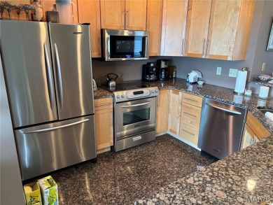 This one is ALL ABOUT THE VIEW !!!  This 2nd floor end unit has