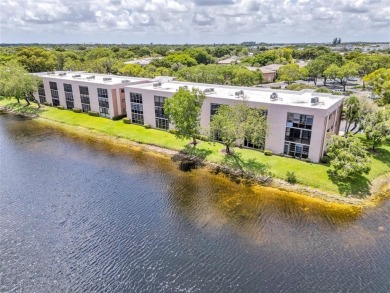 Experience unparalleled lakeside living in this BEAUTIFULLY