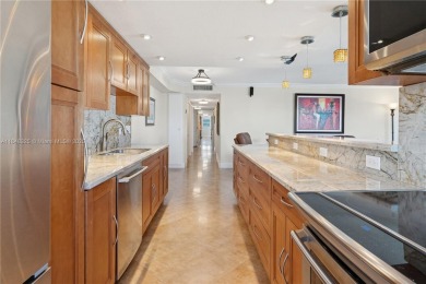 Experience the South Florida lifestyle in this stunning 2 bed/2