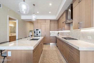 Step inside this beautiful 10th-floor penthouse at Optima