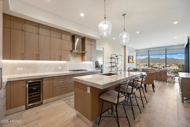 Step inside this beautiful 10th-floor penthouse at Optima