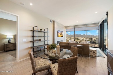 Step inside this beautiful 10th-floor penthouse at Optima