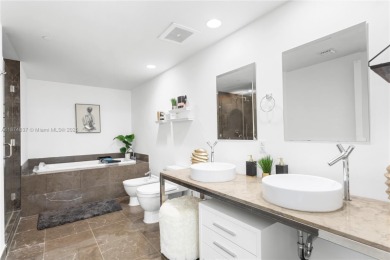 Beautifully furnished corner 2BD/2BA residence at the iconic