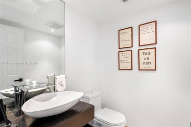 Visit this stunning two story Bayside Village Townhouse on