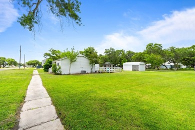 This charming three-bedroom, one-bathroom home sits proudly on a