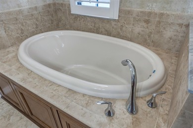 One or more photo(s) has been virtually staged. FORMER MODEL +