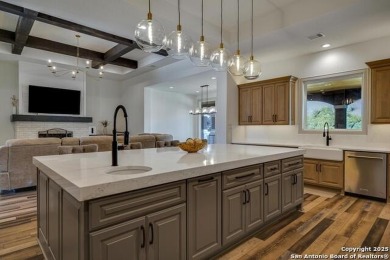 Situated on nearly 5 private acres in the prestigious Mystic