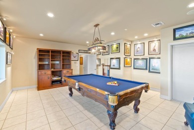 This extraordinary waterfront estate spans over 4,300 sq. ft. of