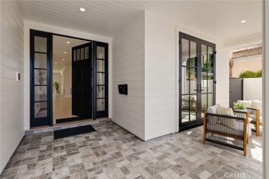 This newly constructed masterpiece in Manhattan Beach offers 6