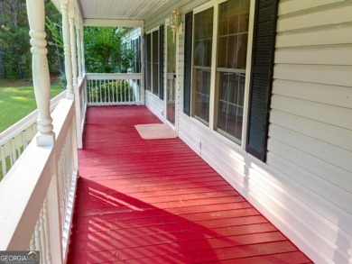 Discover your private oasis on over 10 acres of wooded land