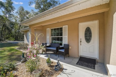 Tucked away on a VERY INTIMATE and ISOLATED.55-acre corner lot