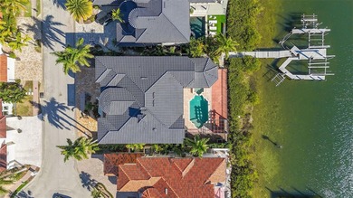 Experience this sleek, modernized Mediterranean masterpiece in