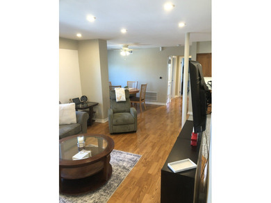 Sunlit top-floor living featuring 2 bedrooms, 1 full bath, and